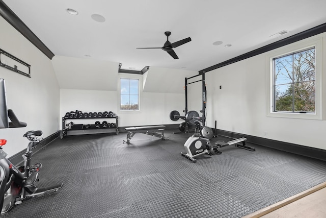 workout room with ornamental molding, a ceiling fan, visible vents, and baseboards