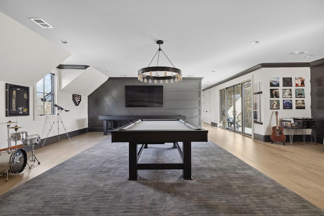 recreation room with visible vents, ornamental molding, wood finished floors, billiards, and baseboards