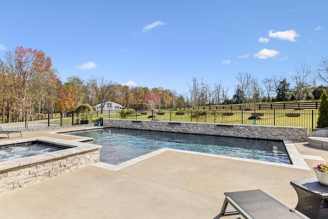 view of pool with a fenced in pool, a patio area, a fenced backyard, and an in ground hot tub