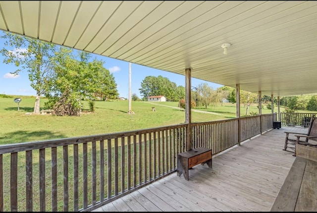 deck featuring a lawn