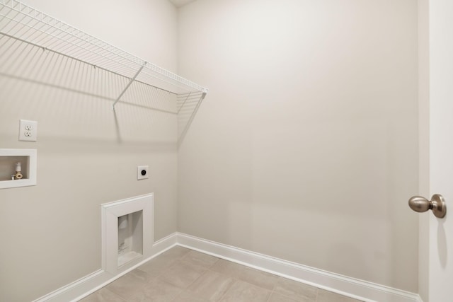 washroom featuring washer hookup, laundry area, baseboards, and electric dryer hookup