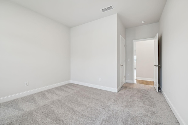 interior space with baseboards and visible vents