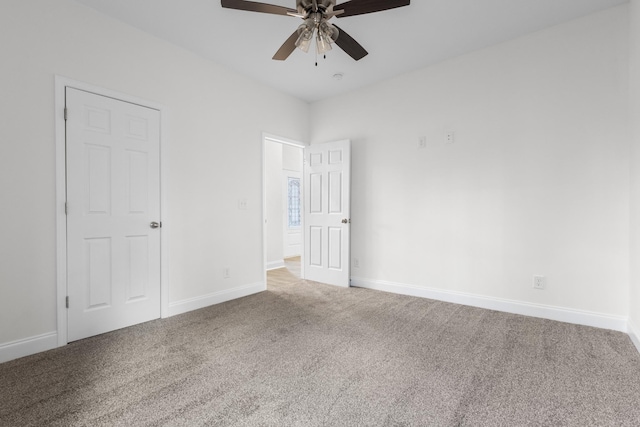 unfurnished bedroom featuring carpet floors, ceiling fan, and baseboards