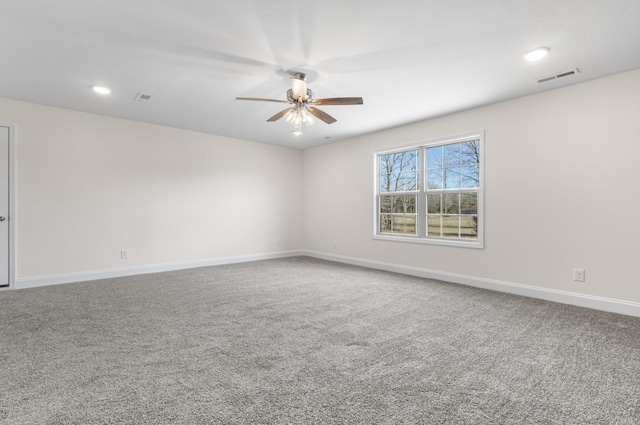 carpeted empty room with baseboards, visible vents, a ceiling fan, and recessed lighting