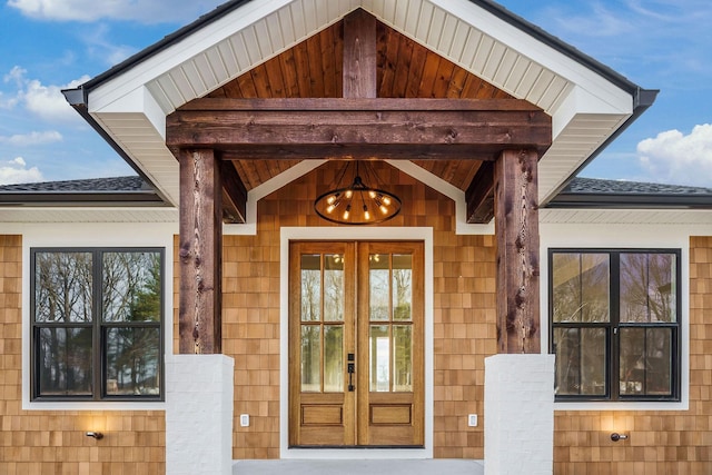 property entrance featuring french doors