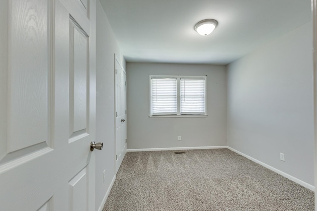 1311 Bel Aire Dr, Tullahoma, TN 37388 - unfurnished room featuring carpet flooring and baseboards