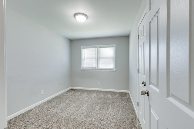1311 Bel Aire Dr, Tullahoma, TN 37388 - unfurnished bedroom featuring carpet flooring, baseboards, and a closet