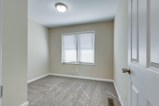 1311 Bel Aire Dr, Tullahoma, TN 37388 - carpeted empty room with baseboards