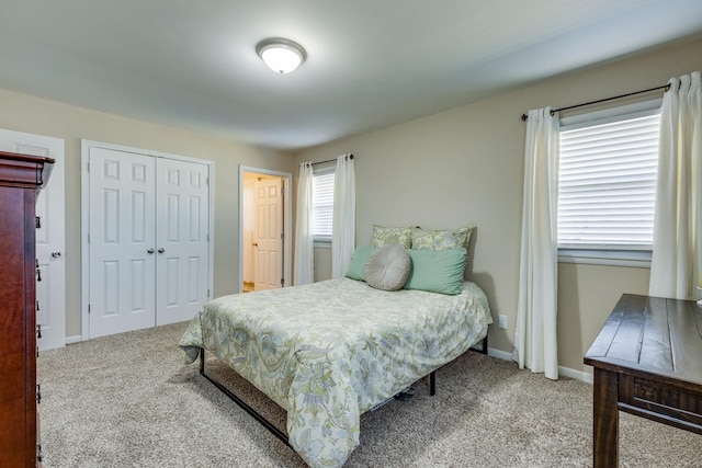 1311 Bel Aire Dr, Tullahoma, TN 37388 - bedroom featuring carpet, a closet, and baseboards