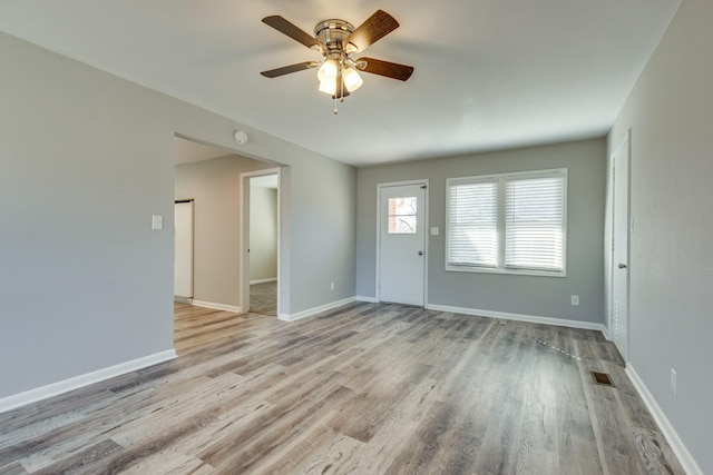 1311 Bel Aire Dr, Tullahoma, TN 37388 - foyer featuring ceiling fan, wood finished floors, and baseboards