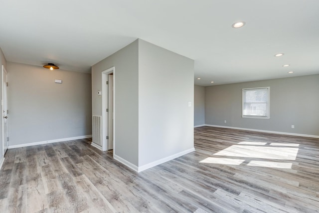 1311 Bel Aire Dr, Tullahoma, TN 37388 - unfurnished room featuring wood finished floors, baseboards, and recessed lighting