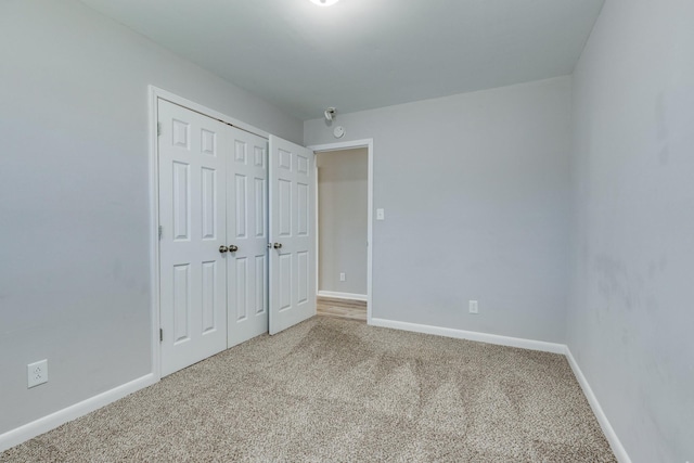 1311 Bel Aire Dr, Tullahoma, TN 37388 - unfurnished bedroom with carpet floors, baseboards, and a closet