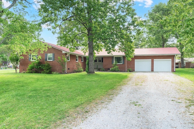 1311 Bel Aire Dr, Tullahoma, TN 37388 - single story home featuring driveway, a garage, a front yard, and brick siding