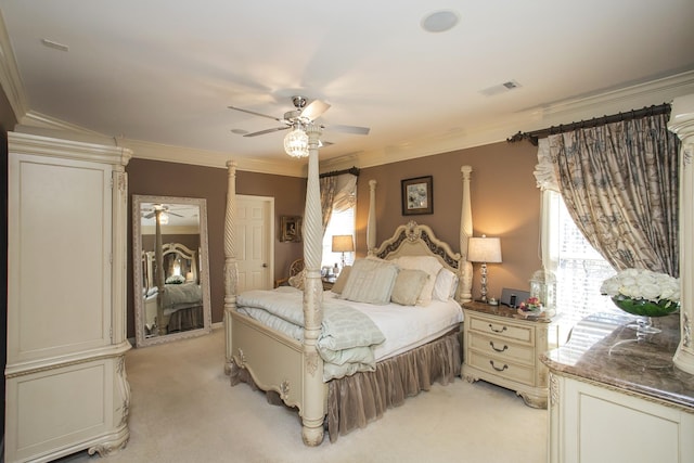 bedroom featuring ornamental molding, light colored carpet, ceiling fan, and visible vents