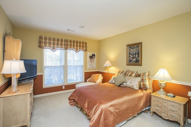 bedroom featuring carpet flooring, visible vents, and baseboards