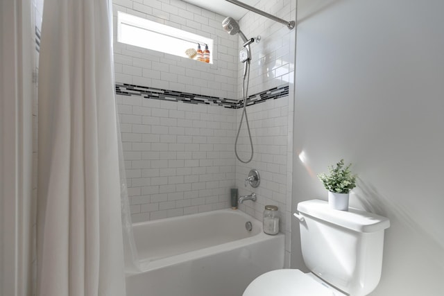 full bath with shower / tub combo with curtain and toilet