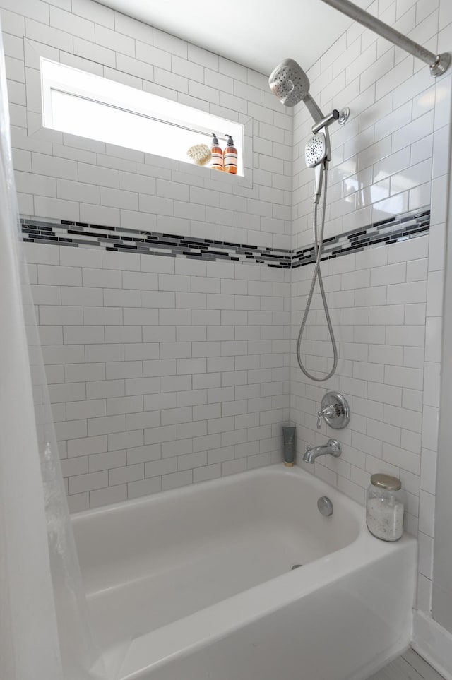 full bath featuring shower / bathtub combination with curtain