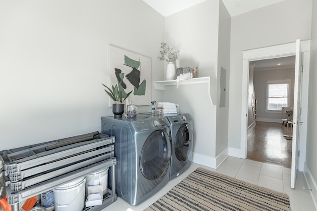 1309 60th Ave N, Nashville, TN 37209 - washroom with baseboards, tile patterned floors, washer and dryer, laundry area, and electric panel