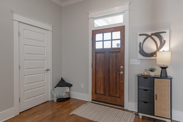 1309 60th Ave N, Nashville, TN 37209 - foyer entrance with baseboards, wood finished floors, and ornamental molding