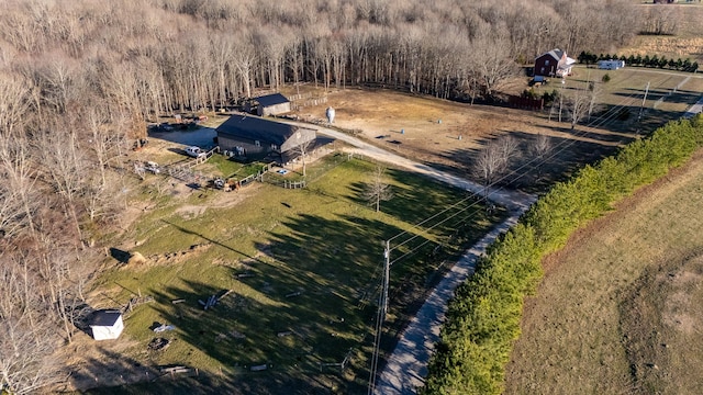 birds eye view of property featuring a rural view