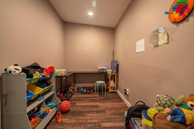 game room with wood finished floors