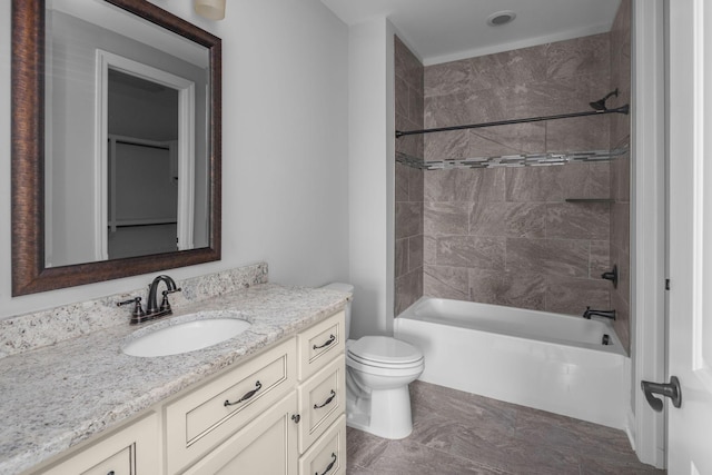 full bath featuring tub / shower combination, vanity, and toilet