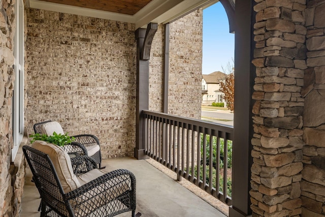 balcony featuring covered porch