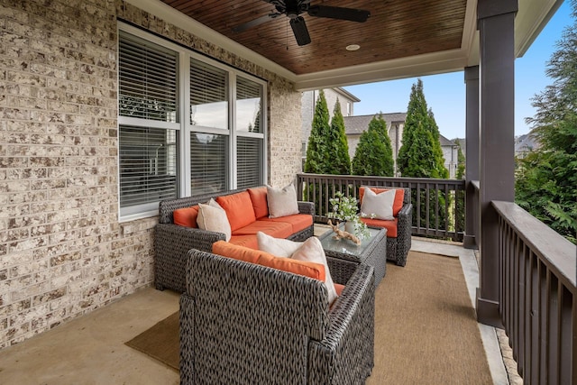 view of patio with ceiling fan and an outdoor living space