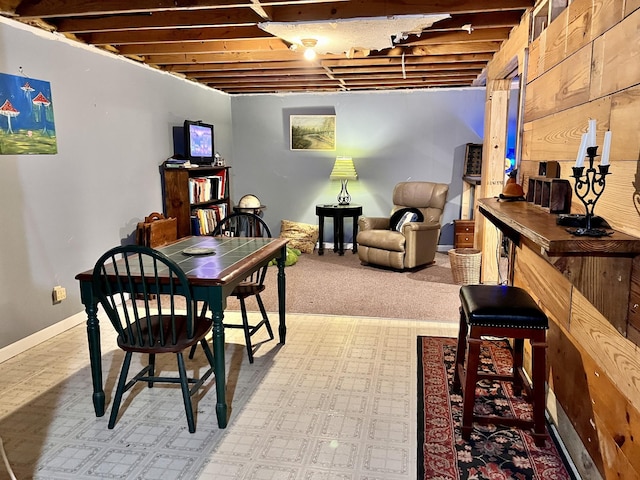 dining area featuring baseboards