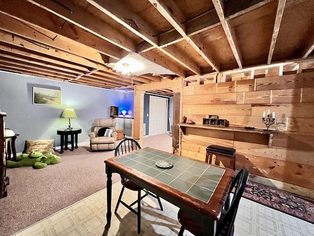 dining area featuring carpet