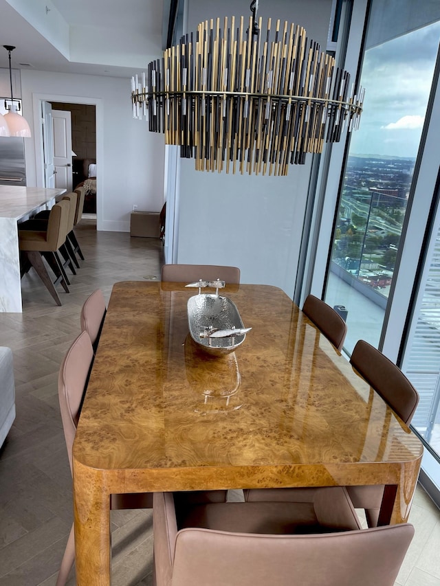 dining area featuring baseboards