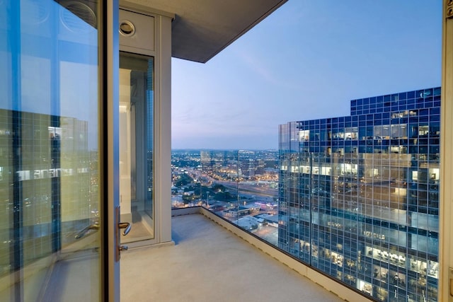 balcony featuring a city view