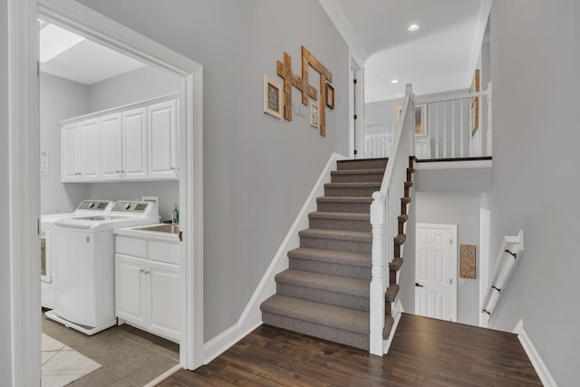 interior space with recessed lighting, independent washer and dryer, baseboards, and wood finished floors