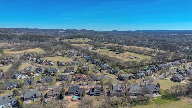 drone / aerial view with a residential view and a mountain view