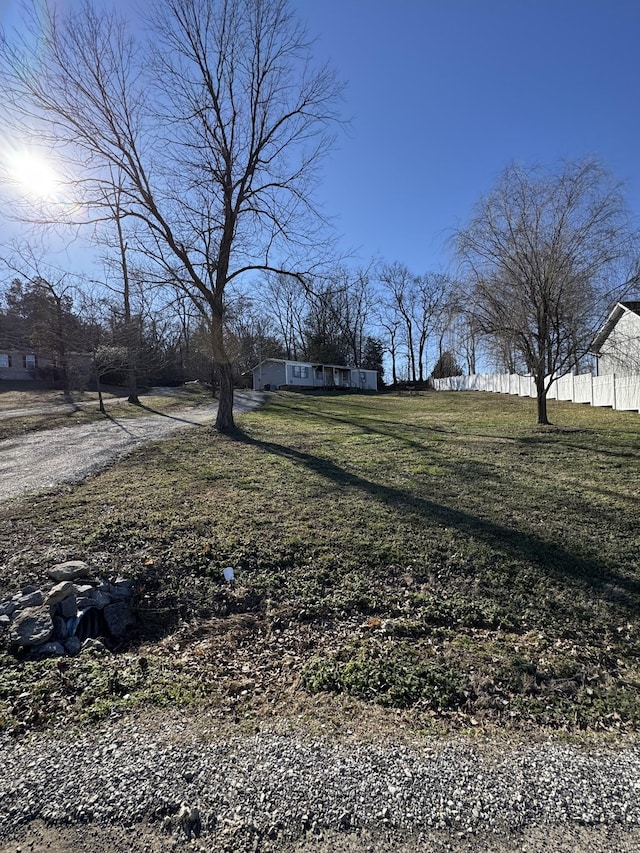 view of yard featuring fence