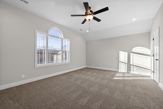 carpeted empty room with recessed lighting, vaulted ceiling, baseboards, and ceiling fan