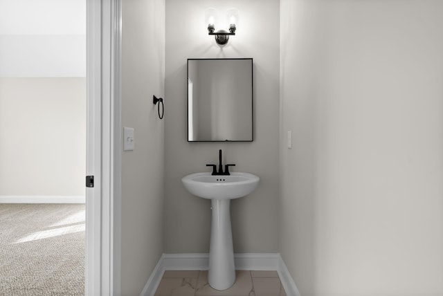 bathroom with baseboards