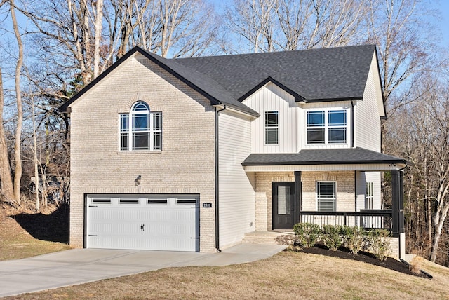 view of front of property with a garage, driveway, a porch, board and batten siding, and brick siding