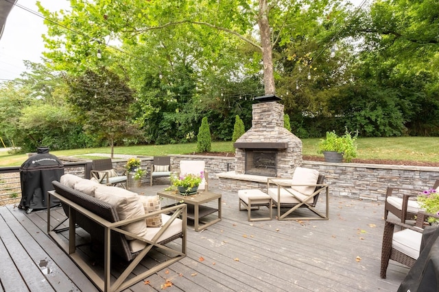 wooden terrace featuring an outdoor living space with a fireplace