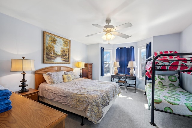 bedroom with carpet and a ceiling fan