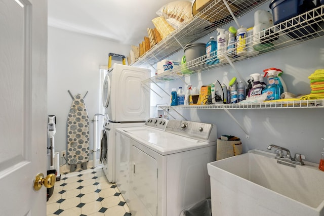 washroom with laundry area, light floors, a sink, and hookup for a washing machine