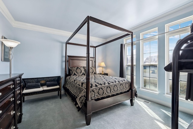 carpeted bedroom with visible vents and ornamental molding