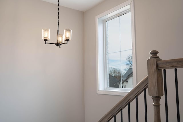 interior details with an inviting chandelier