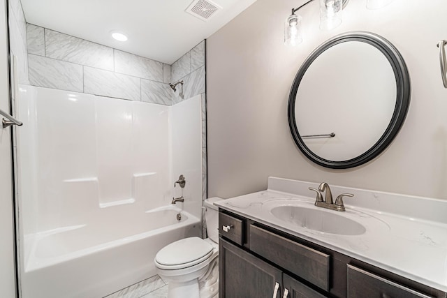 bathroom featuring visible vents, vanity, toilet, and shower / bathtub combination