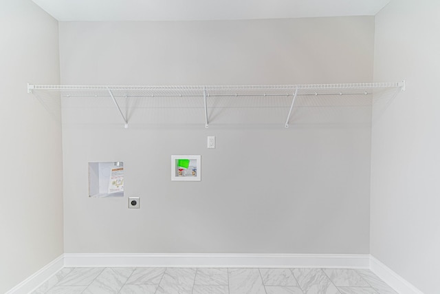 laundry room with laundry area, baseboards, marble finish floor, and hookup for an electric dryer