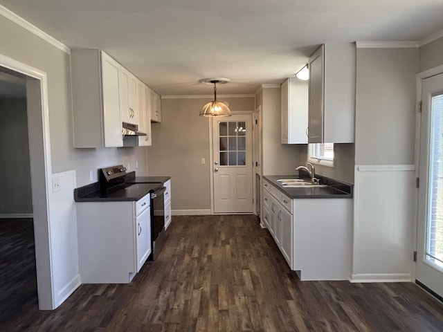 kitchen featuring dark countertops, dark wood-style flooring, stainless steel range with electric cooktop, and under cabinet range hood