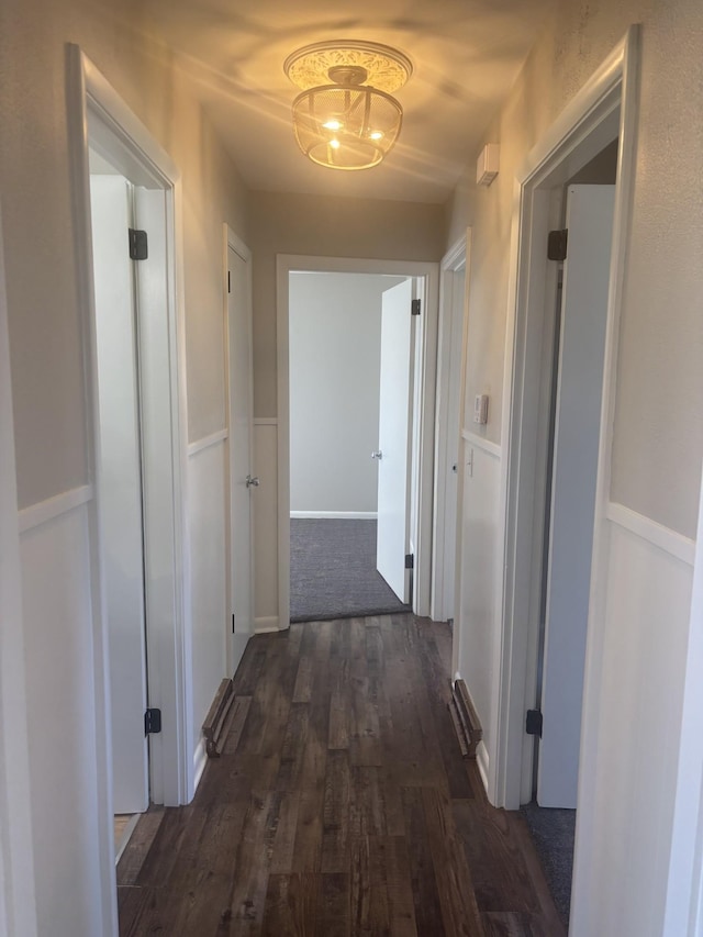 hall with dark wood finished floors