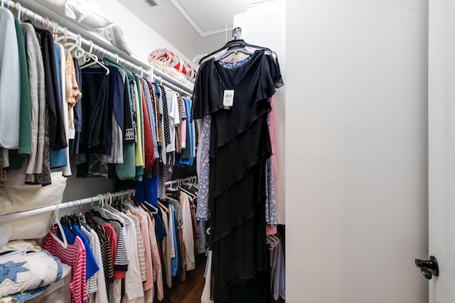 spacious closet with visible vents and wood finished floors