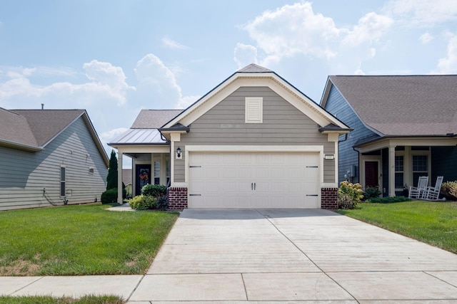 view of front of property featuring a garage, concrete driveway, brick siding, and a front yard