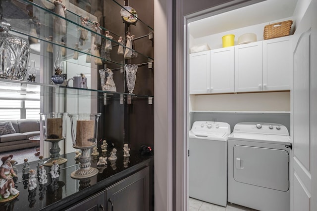 laundry room with independent washer and dryer